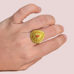 Golden Teardrop Ring with Red Accent